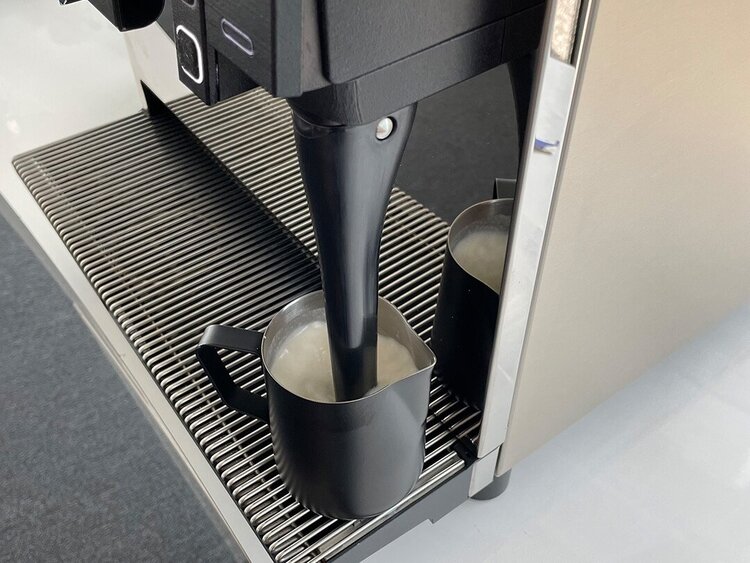 Motta coffee pitcher with steam lance from coffee machine